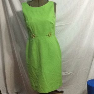 Sleeveless lime green fitted dress with faux belt.   B40